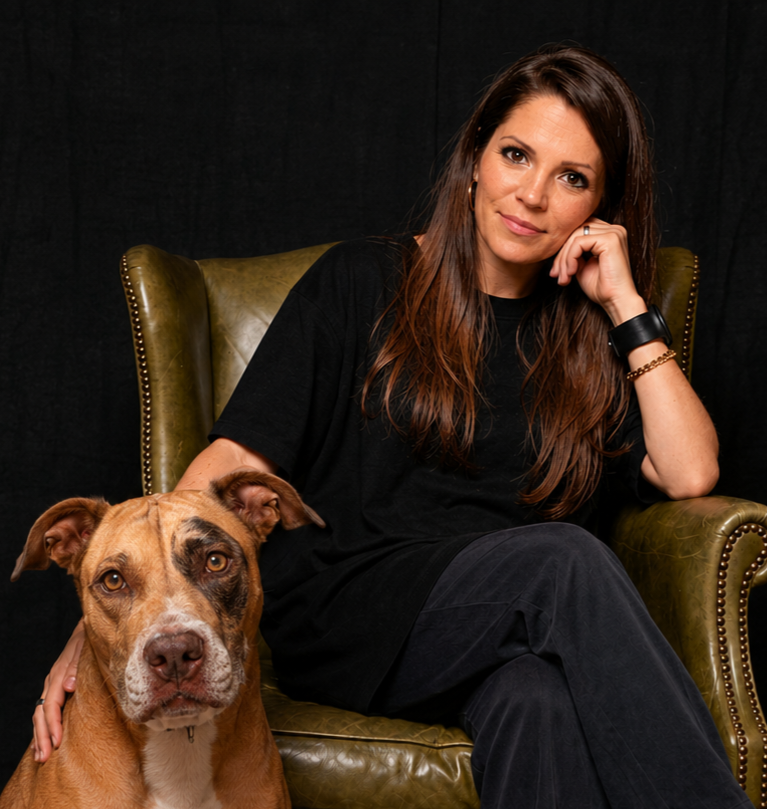 Cynthia, owner and groomer at ReFURbish Pet Spa, with her dog.